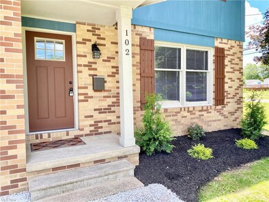 You are welcomed into the home by a new mission style front door and new landscaping.