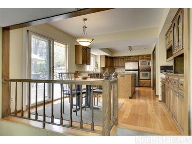 The spacious kitchen and casual dining area overlo