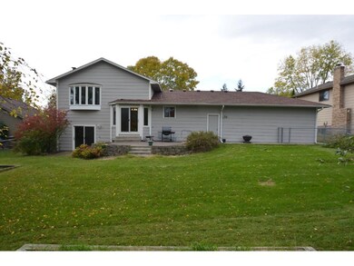 The home features two walk-outs to the fenced back
