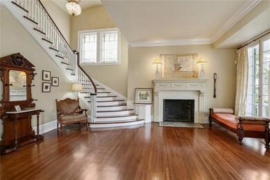 Elegant entry -- beautiful fireplace, high ceiling