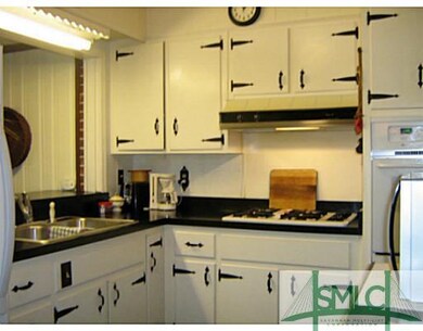 Kitchen. Love the kitchen with white and black dec