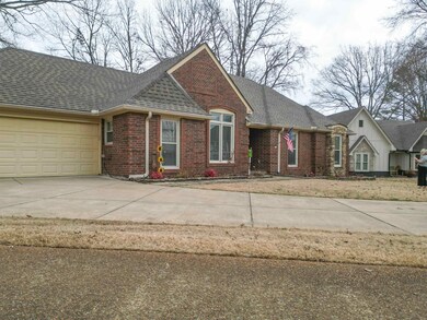Single story home with a garage
