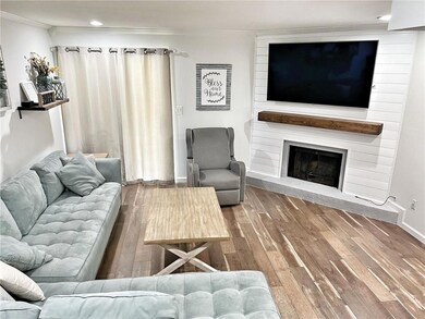 Laminate Flooring & Wood Fireplace