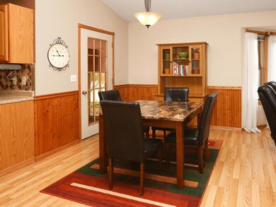 Dining area with walk out to 3 season porch