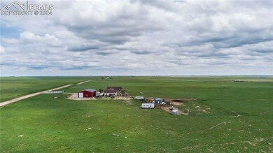 Birds eye view of property with a rural view