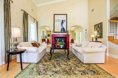 Formal living room with cathedral ceilings.