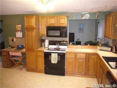Kitchen. Kitchen with office space and pass through to family room.