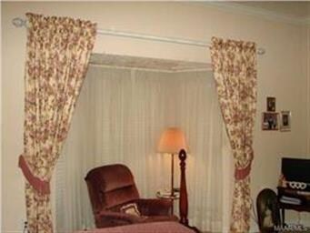 Large window in the main bedroom
