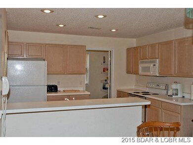 Kitchen and breakfast bar