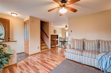 Foyer area and view of stairs to upper level and l