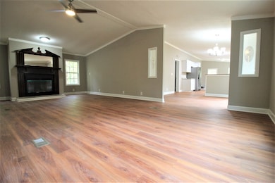 The Great Room with it's elegant wood burning fireplace and open feeling is the perfect place to hand for the evening.