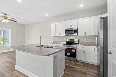 Kitchen with appliances with stainless steel finis