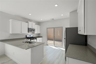 6730 Violet Cascade Ave, Las Vegas, NV 89156 - photo 4