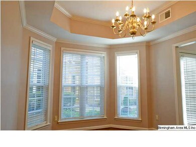 Separate dining area with large windows for natura