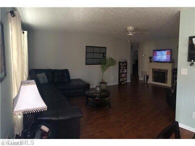 Living Room. Wood floors through out home.