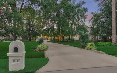 Nicely landscaped front yard offers shade trees an