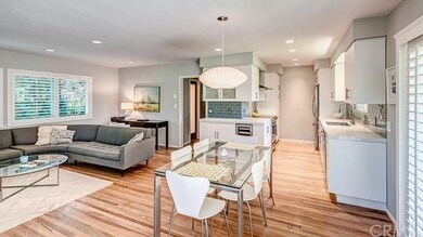 Large living area with hardwood floors