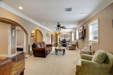 View of living area open to dining room from front