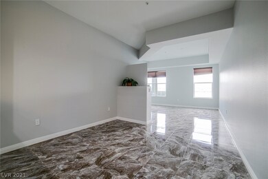 Living area has ceramic marble-look tile and fresh