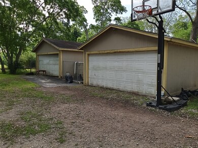 TWO TWO CAR GARAGES.