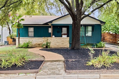 Ranch-style home with board and batten siding, st