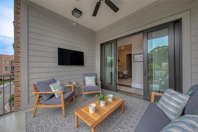 View of patio with ceiling fan
