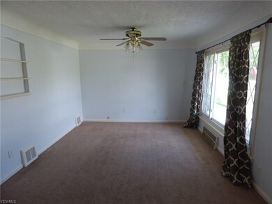 Hardwood floors under all carpet in the house!