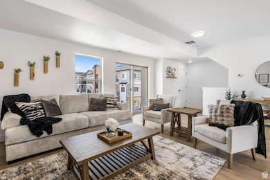 Living area featuring light wood-style flooring