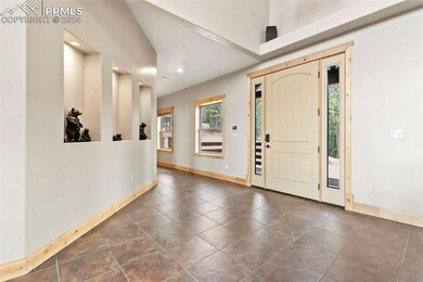 Property entrance featuring covered porch