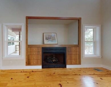 Cozy Fireplace w/ Custom Built In Cabinetry...