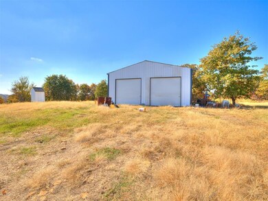 30x60 garage with 3 - 10' doors Water hookups, 50 