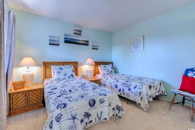 Bedroom with carpet flooring
