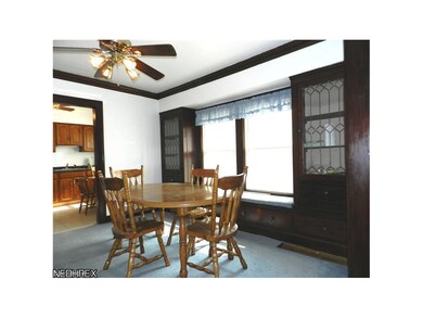 Window seat with leaded glass china cabinets.