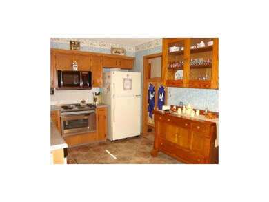View of kitchen. Sideboard does not stay.