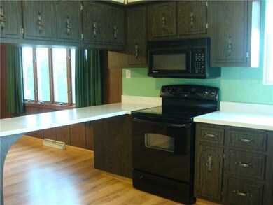 Kitchen. The spacious kitchen has lots of cabinets