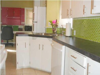 Updated kitchen features plenty of cabinets and co