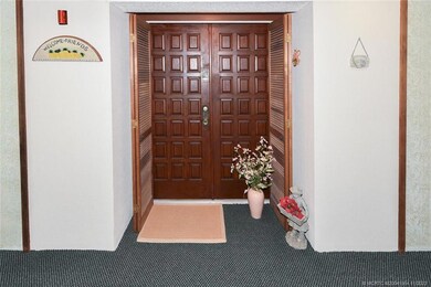 Double Door Entrance with Louvered outer doors tha