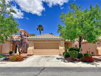 View of front facade featuring an attached garage,