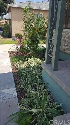 Inviting walk way to front door feature drought to