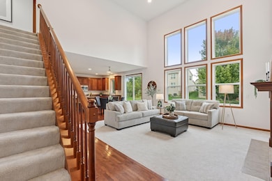 Living and dining flow seamlessly into the kitchen