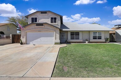 Beautifully Landscaped Front & Back