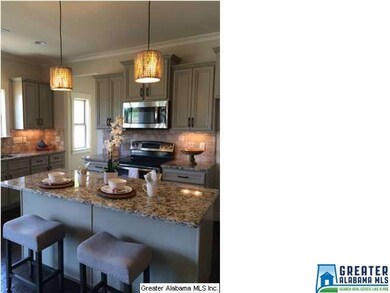 Beautiful Pendants over the family size island.