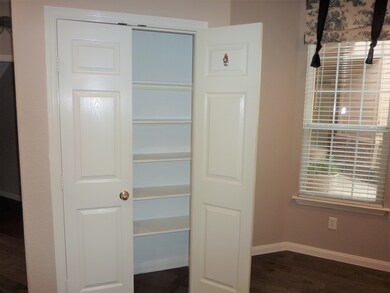 There is a large pantry next to the breakfast room