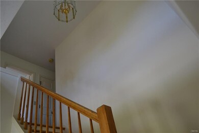 The main entryway into the home includes a two sto