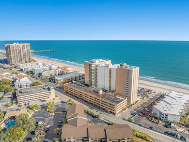 View of urban area with waterfront with a beach