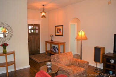 Beautiful hand-scraped hardwoods in entry, living