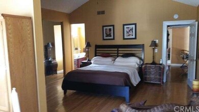 Expanded master suite with sitting area/sun room, 