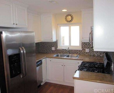 Upgraded kitchen with newer cabinets, granite coun