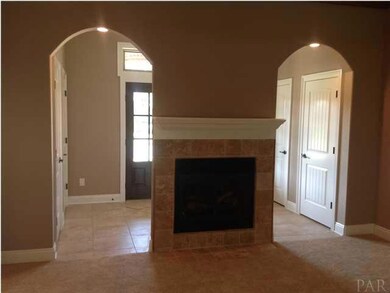 Entrance has nice size foyer with wood stain doors and closets on both sides. The entrance to the great room has two arched entry ways with a gas fireplace in the middle.