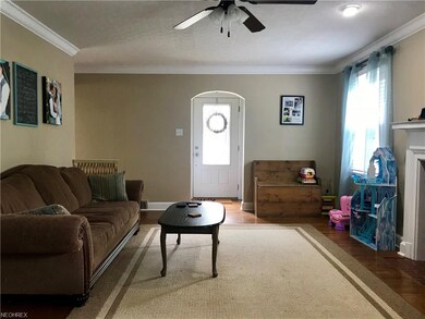 Large living room with hard wood floors and lots o